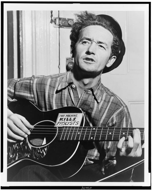 Woody Guthrie by Al Aumuller - 1943.