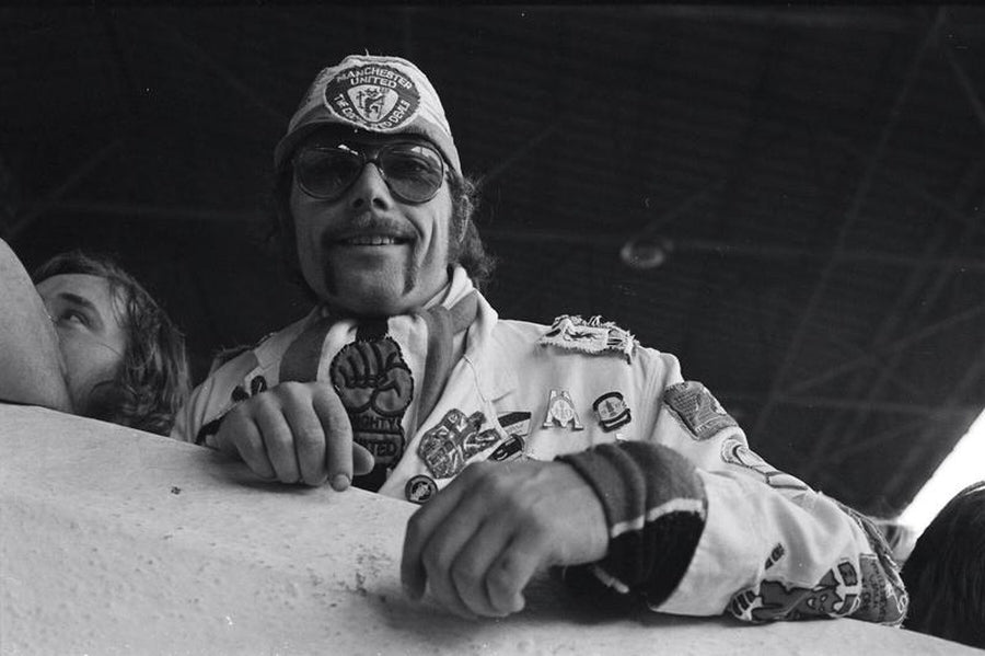 Manchester United Fan With Badges by Iain SP Reid - c. 1976
