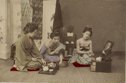 Portrait of three Japanese women with tea and toiletries, anonymous, c. 1870 - c. 1891
