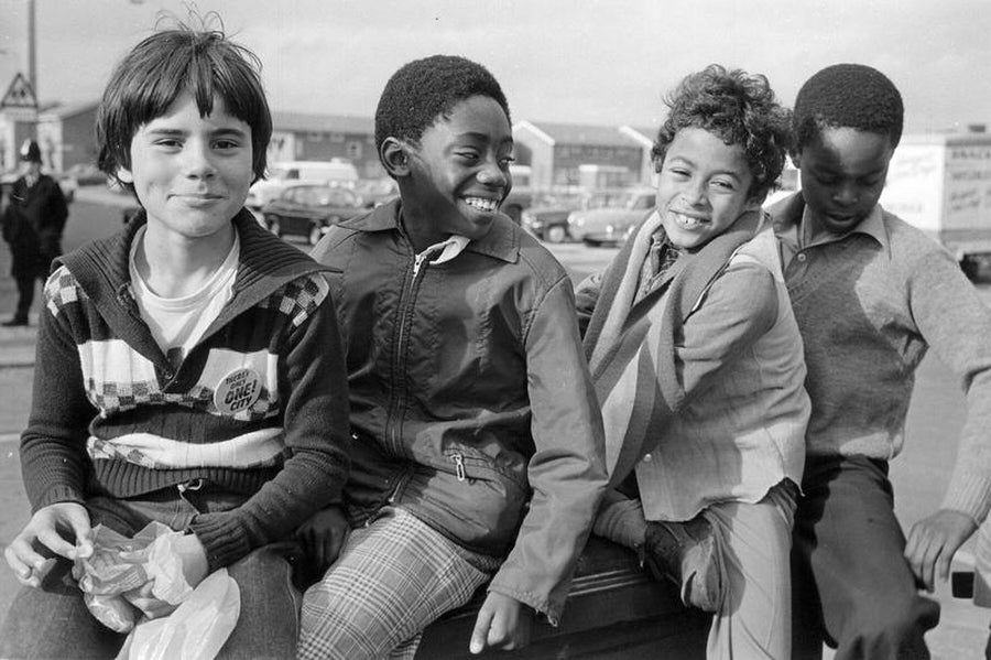 Four Kids on a Wall in Manchester by Iain SP Reid - c. 1976