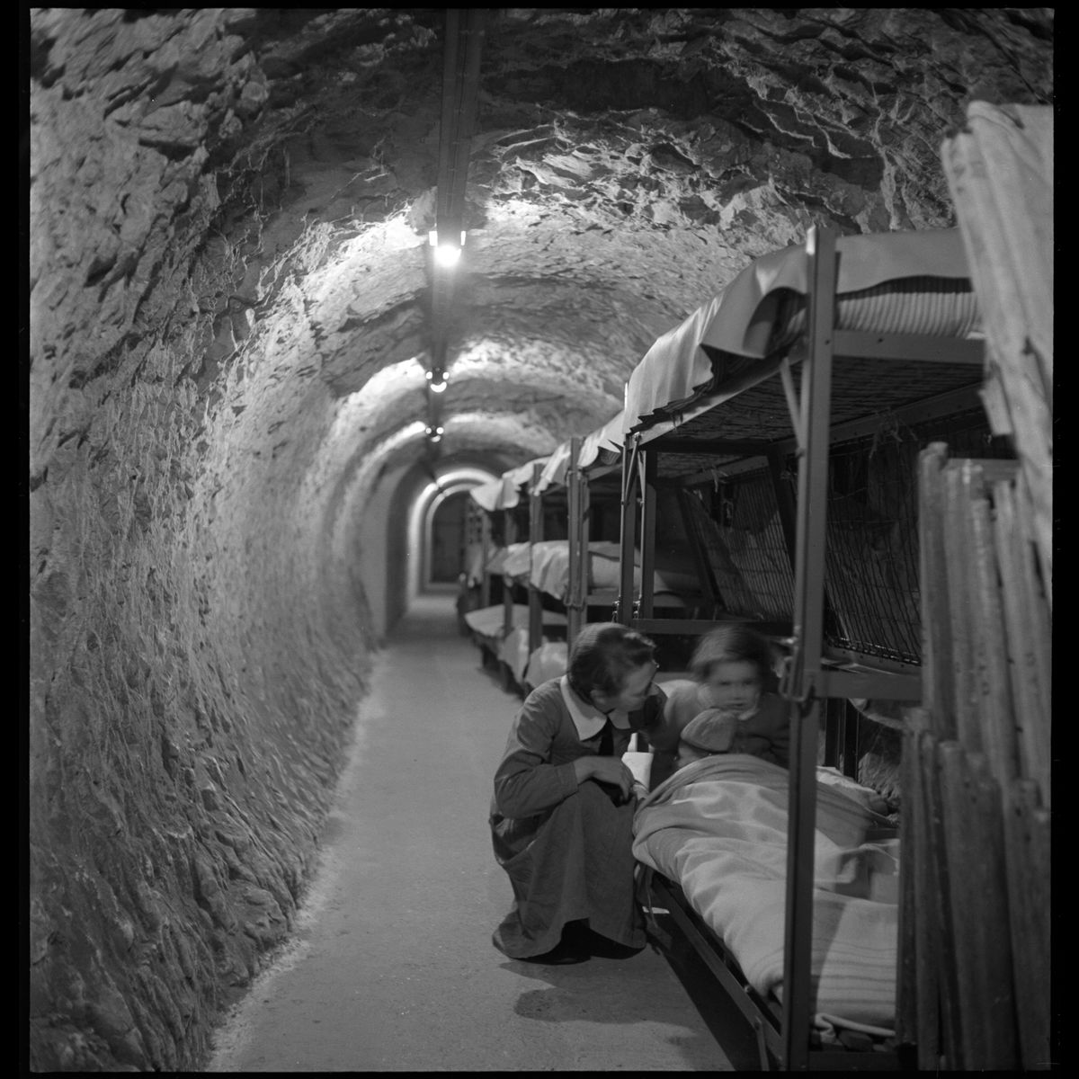 Sheltering In the London Underground During World War II by Toni Frissell - 1945