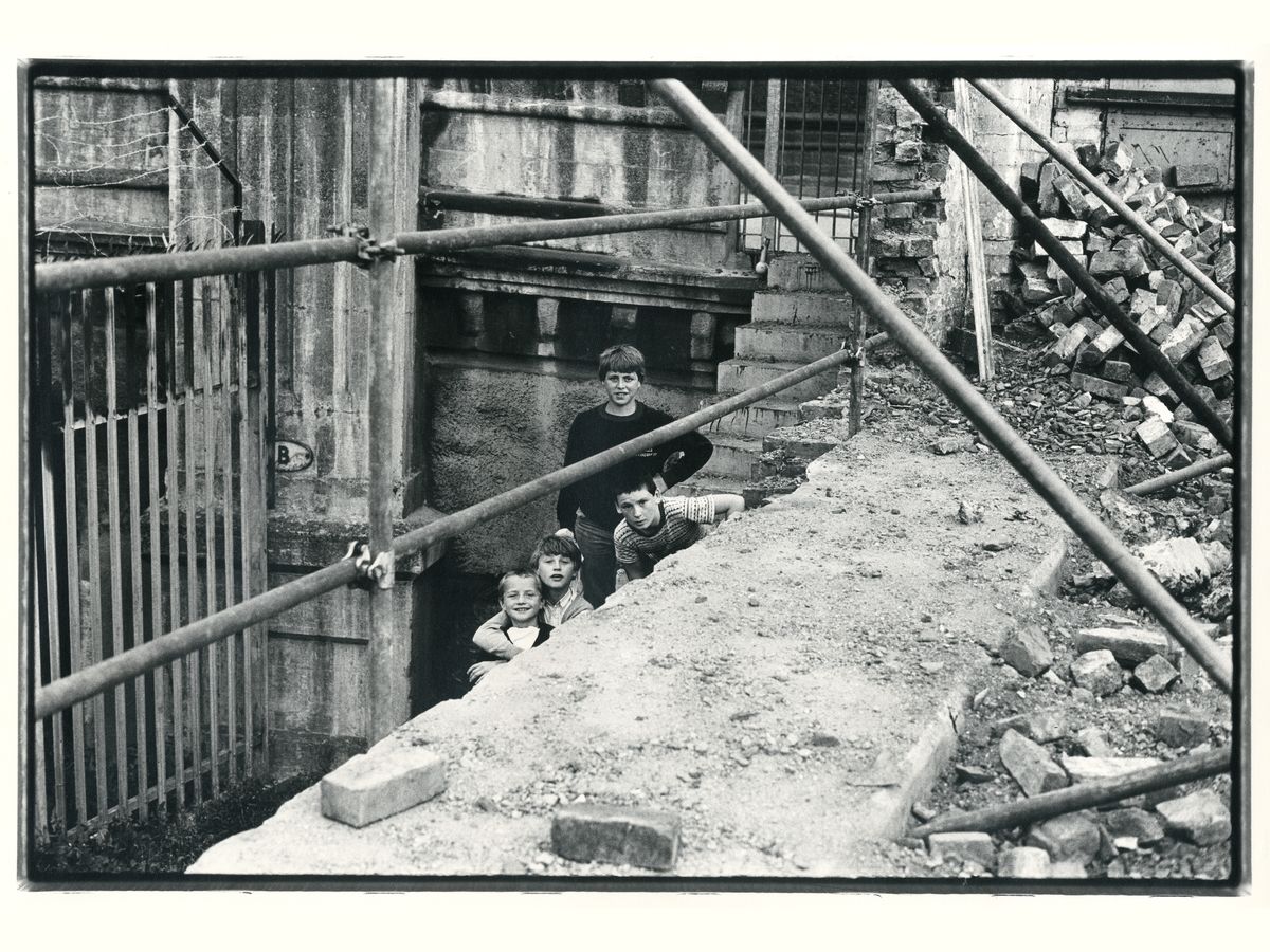 Four Lads at the Tate & Lye Factory in Liverpool by Dave Sinclair - 1980s