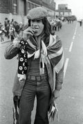 Football fan eating a pie in Manchester, England by Iain S.P. Reid - c. 1976