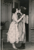 Photograph of Actresses Shirley Mason and Viola Dana sharing a kiss by Anonymous, c.1919 - Postcard