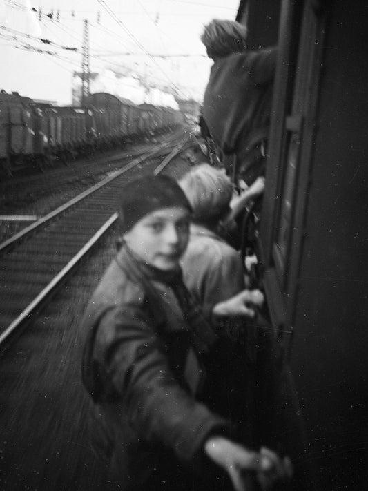 Boys Cling On to a Train as They Celebrate The Netherlands' Freedom from German Occupation (IV) - by Menno Huizinga - 1945