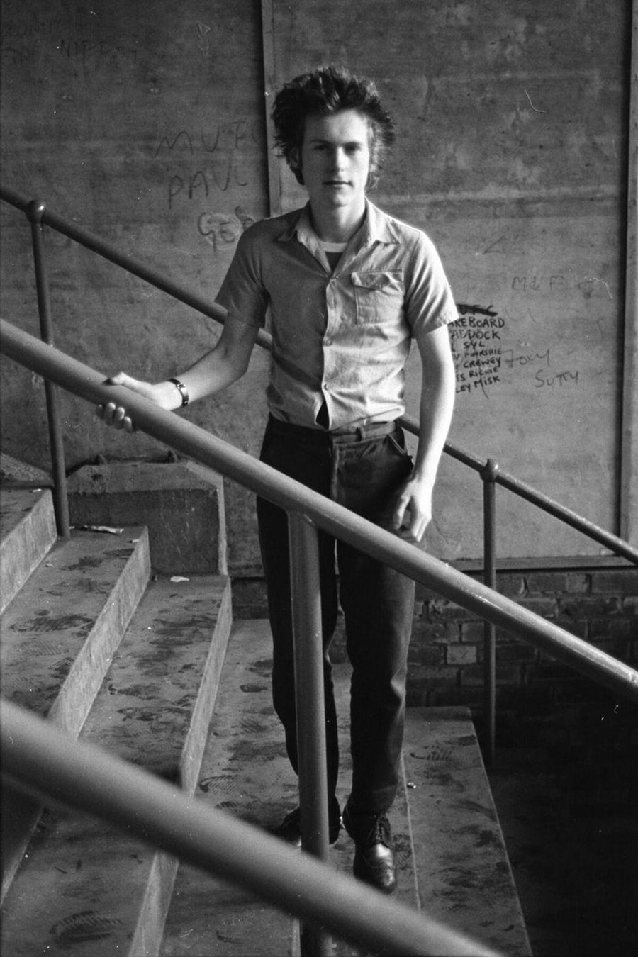 Fan Standing on the Stairwell by Iain SP Reid - c. 1976