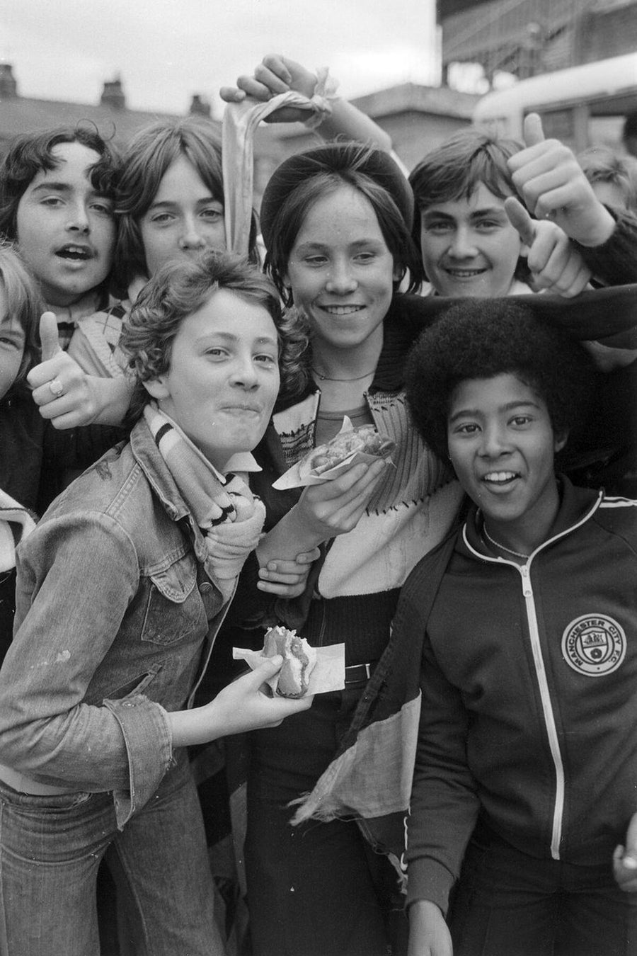 Manchester City Teenagers Eating Hot Dogs by Iain SP Reid - c. 1976