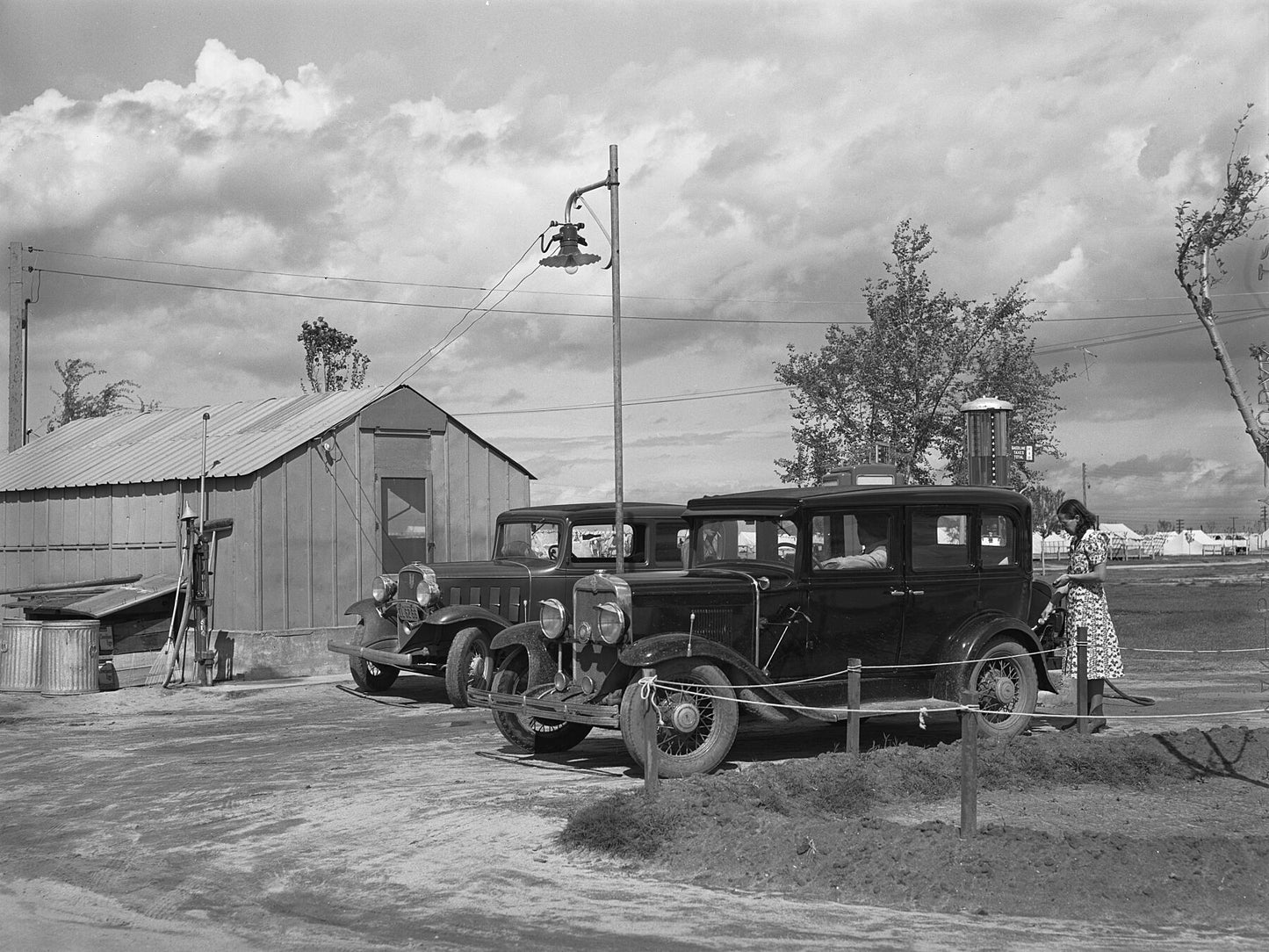 Cooperative gas station - Shafter migrant camp, Shafter, California by Arthur Rothstein - 1940