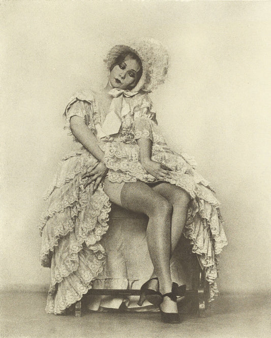 Seated Woman in a Ruffled Dress with Coquettish Facial Expression by Arthur F. Kales - c.1920