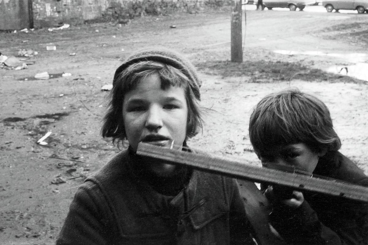 Two Boys At A Glasgow Tenement by John J Brady - 1975