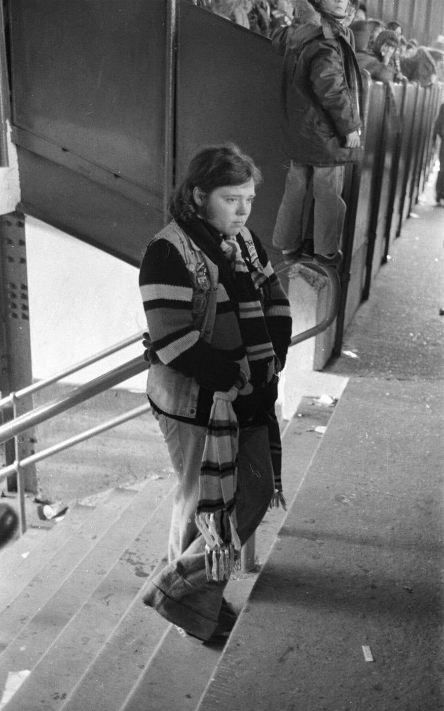 Manchester United Fan On The Stairs by Iain SP Reid - c. 1976