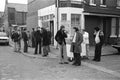 Eating at the Burger Stand in Manchester, England by Iain SP Reid - c. 1976