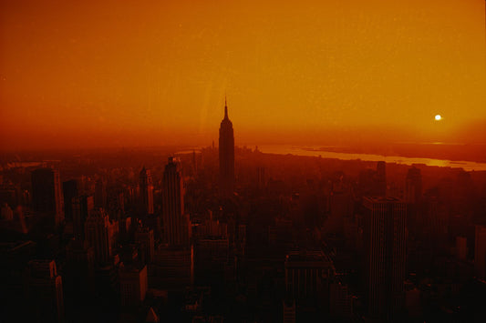 December 1968 - NYC skyline at sunset, showing Empire State Building, New York by  Gerry Cranham.