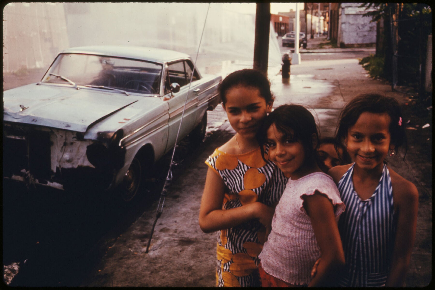 Three Young Girls on Bond Street, Brooklyn by Danny Lyon - 1974